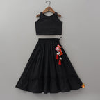 Pre Order: Top With Embroidered Overlay Cape And Tassel Detailed Flared Lehenga