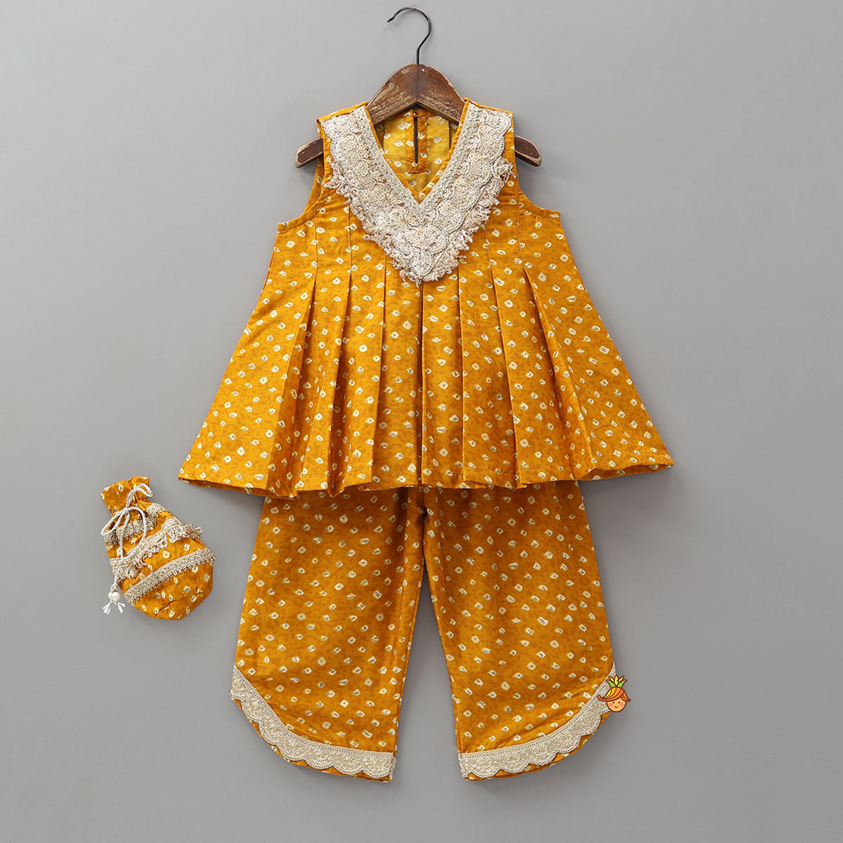 Pre Order: Box Pleated Bandhani Printed Ethnic Kurti And Stylish Pant With Potli Bag