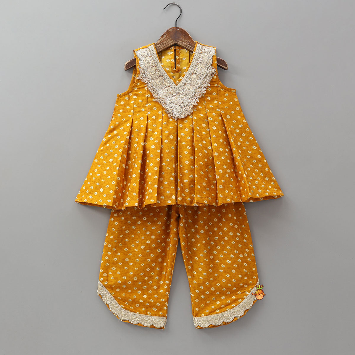 Pre Order: Box Pleated Bandhani Printed Ethnic Kurti And Stylish Pant With Potli Bag