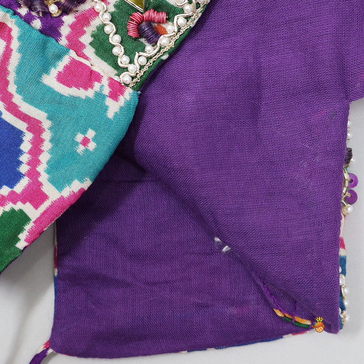 Pre Order: Heavily Embroidered Colourful Top And Lehenga With Potli Bag